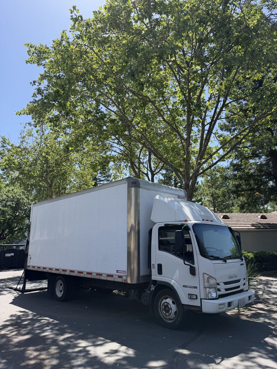 Lynx Movers box truck parked on a Sacramento street
